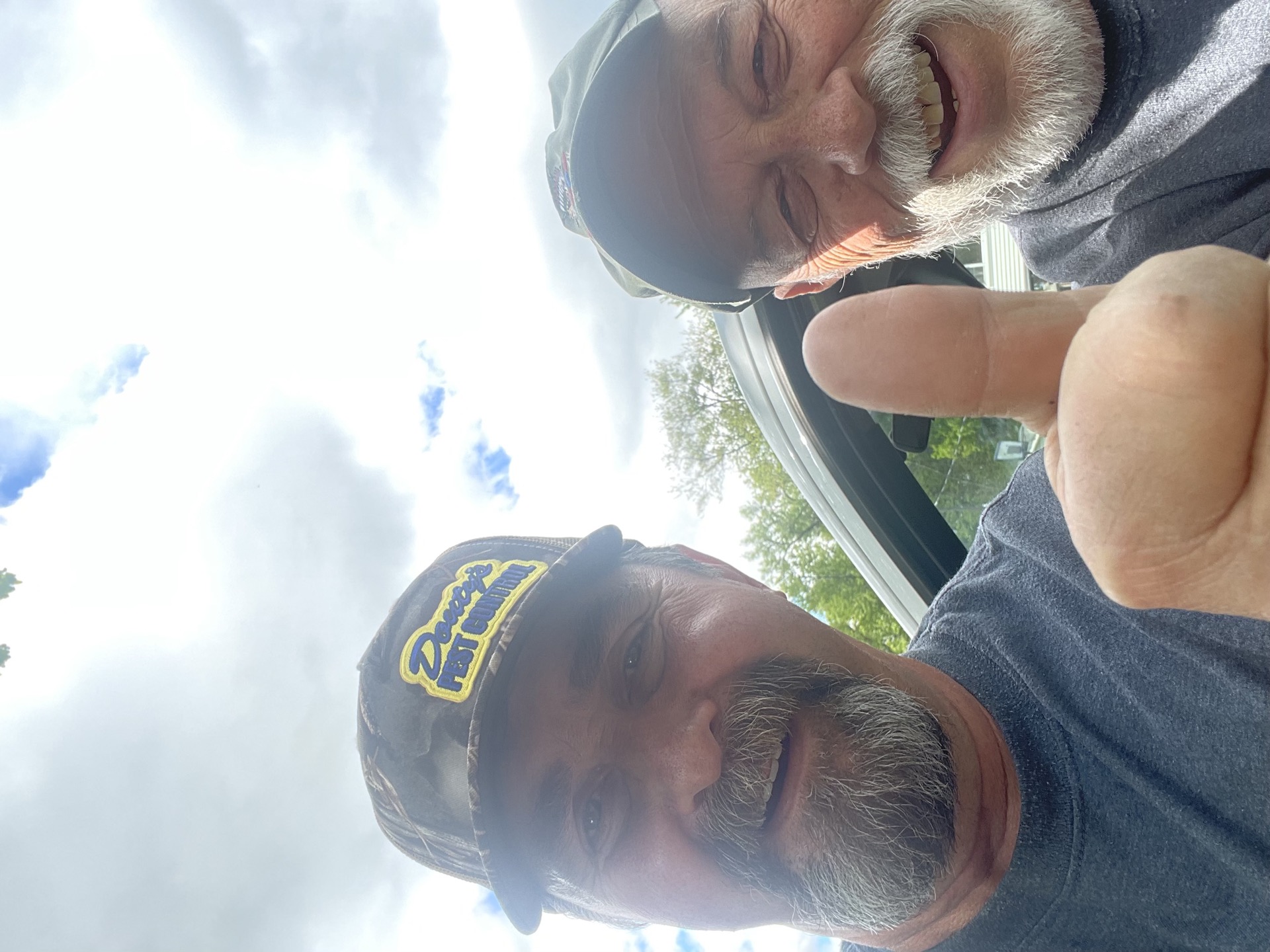 Douty's Pest Control technician with a Williamsport customer after termite service