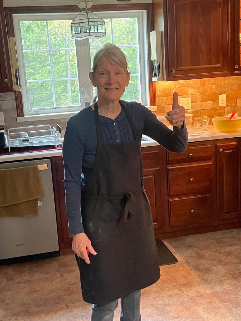 A Williamsport homeowner giving a thumbs-up in her kitchen after a Douty's visit