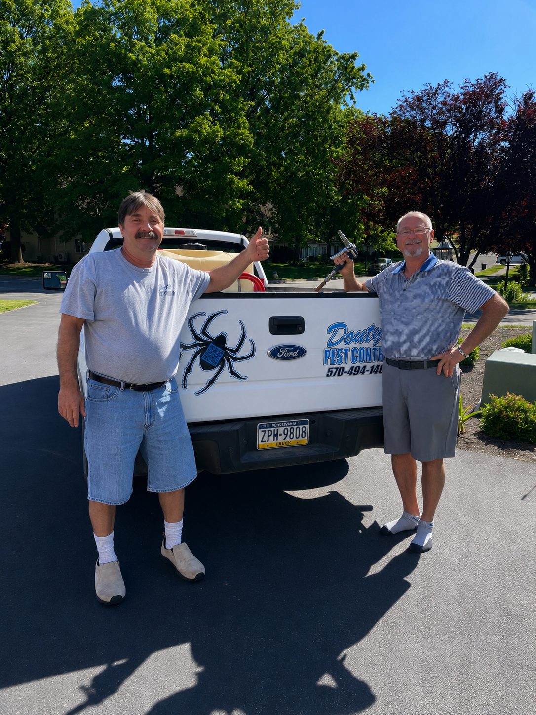Douty's residential pest control technician with a Williamsport-area customer